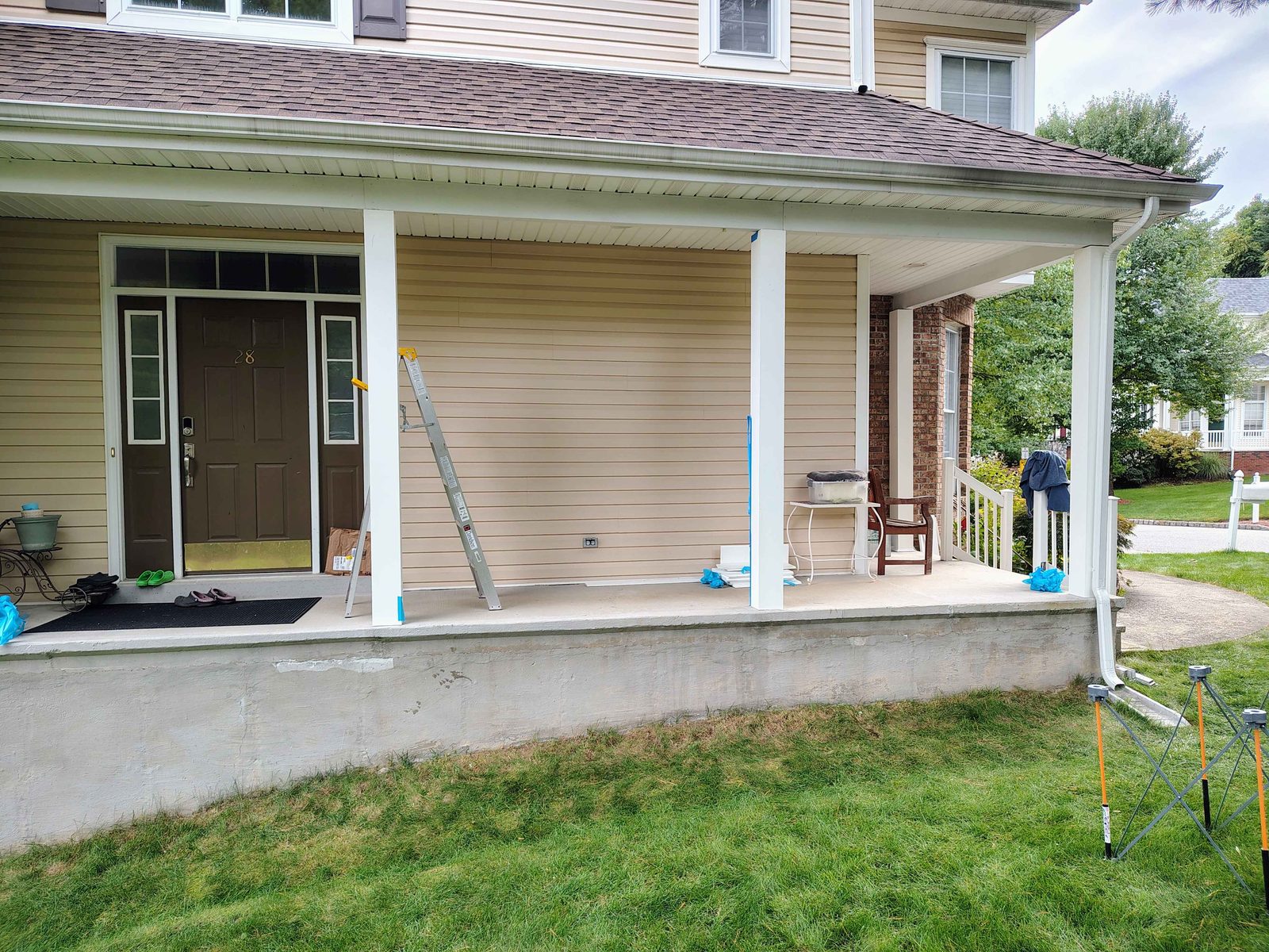Front porch in Oakland NJ with all five rotted posts replaced by new columns
